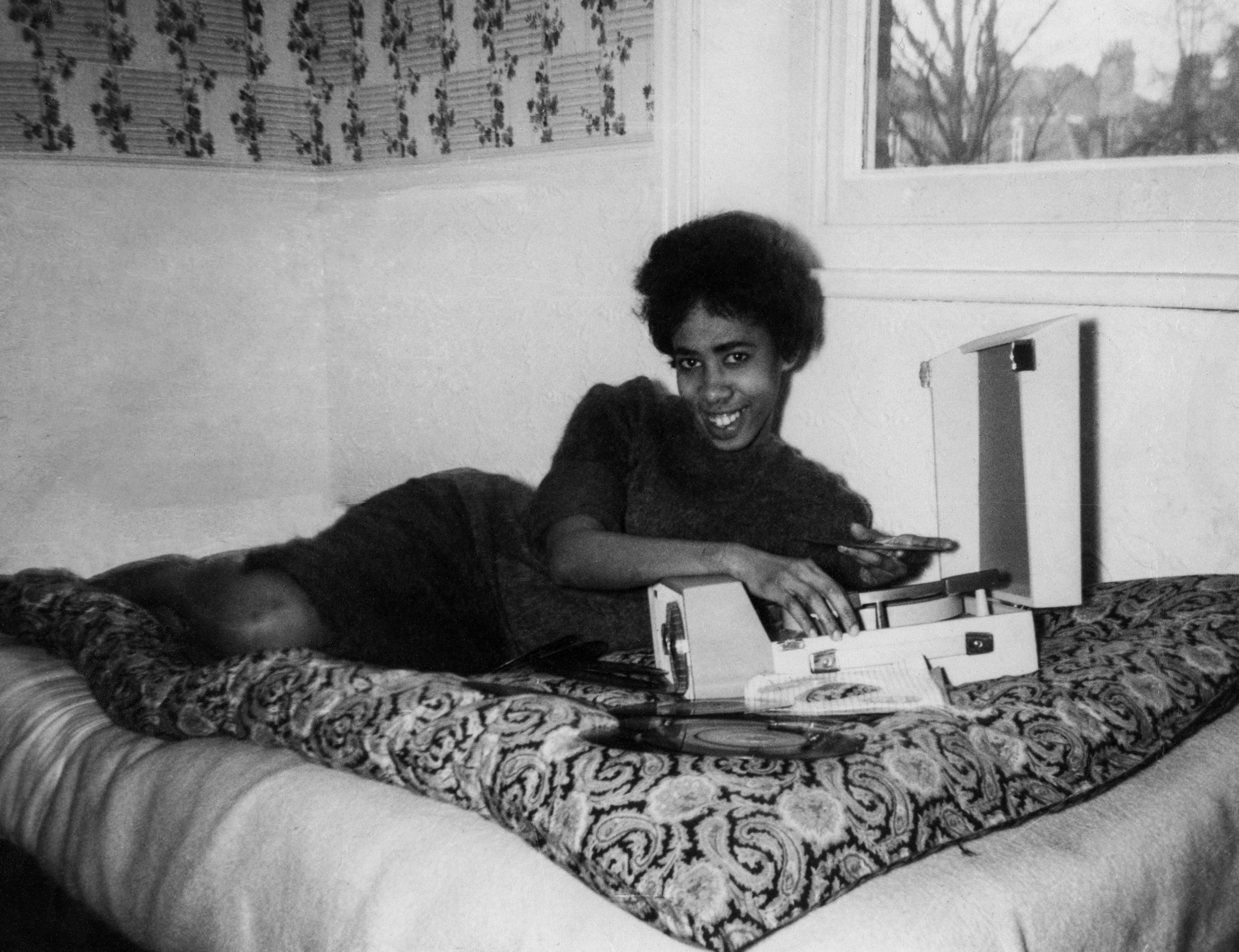 Rose_009 Rose in her bedroom listening to Bob Marley on her Dancette Record Player. Public Submission from our Grown Up In Britain campaign