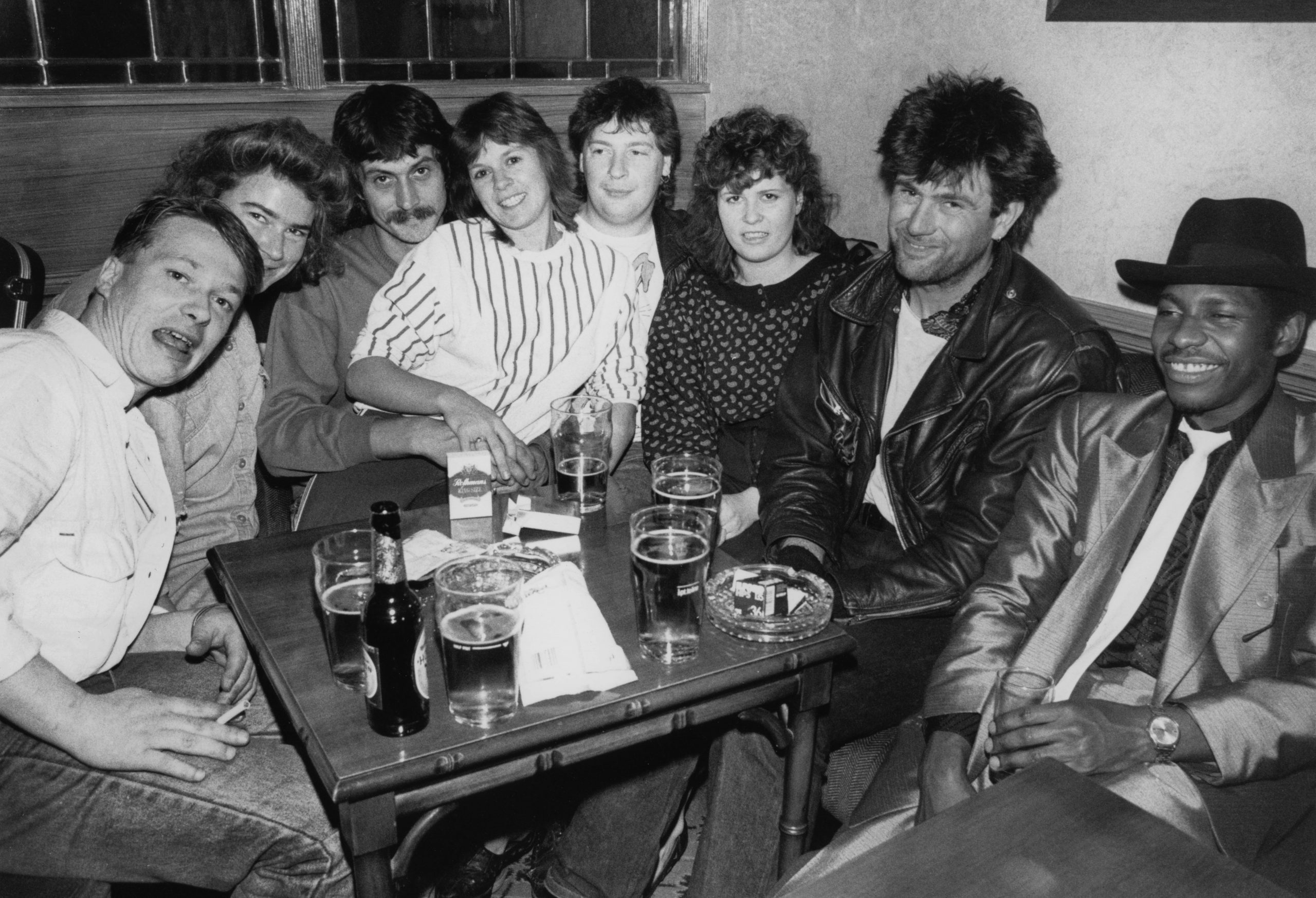 Alexander-Apperley-pub-chips A group of friends in the pub, London, 1980s by Alex Apperley