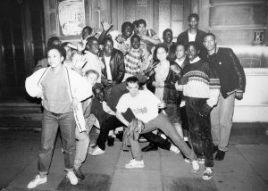 Large group outside Camden Town Hall for Youth Against Apartheid event London 1986