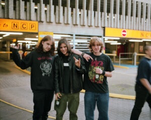 Trio Throwing Up the Horns, UK, 2000s